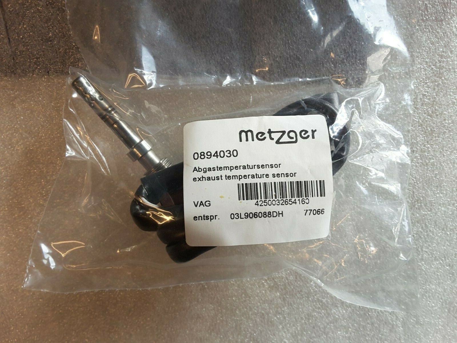 Sensor de temperatura de gases de escape Original Metzger 0894030 VW Caddy, Touran Nuevo.