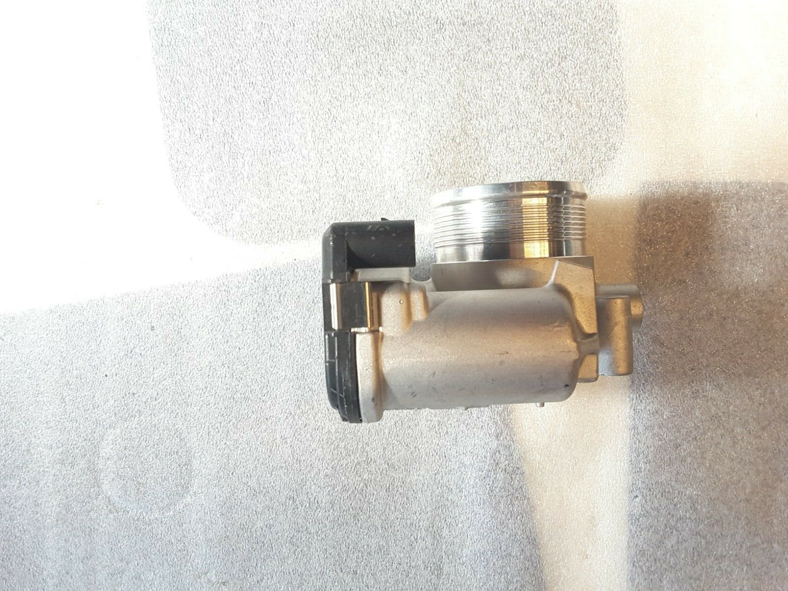 Throttle body original VW Passat TSI 06K133062C NEW.